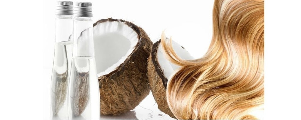 aplicacion de mascarilla capilar con aceite de coco
